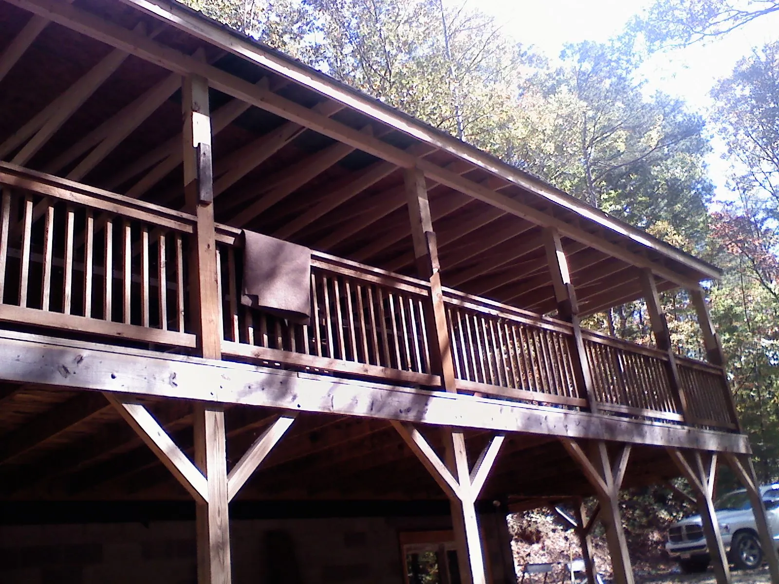 Timber framing under a new elevated porch and deck — Roof Leak Repair in Hot Springs by Roofing Brothers